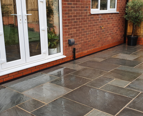 Traditional patio in grey sandstone